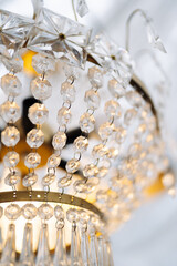 Chrystal chandelier close-up. Glamour background with copy space