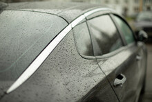 Black Premium Car. Transport In Raindrops.