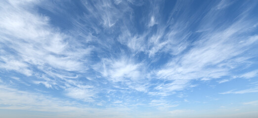 Wall Mural - White clouds against blue sky background