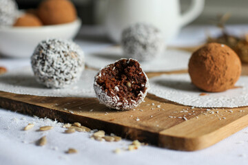 Vegan chocolate balls made from medjool dates, cocoa, desiccated coconut, sunflower seeds and grain milk. These are great option for a healthy and sweet afternoon snack.