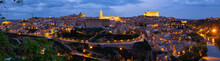 Scenic Panoramic View Of Spanish City Of Toledo On Banks Of Tagus River Overlooking Illuminated Medieval 