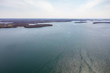 Wall Mural - Cumberland beach  amigo beach  water drone view islands  in Ontario Canada  summer time blue skies 