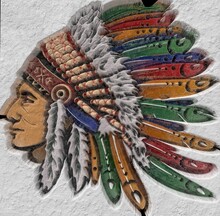 3D Illustration Of A Digitally Sculpted And Textured Side View Of An Indian Chief With An Elaborate Headdress.