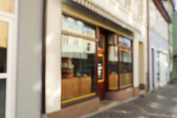 Blurred view of store exterior. Bokeh effect