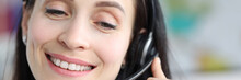 Woman In Headset Working In A Call Center, Face Close-up