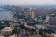 © Westend61 - Egypt, Cairo, Elevated view of river Nile and surrounding buildings at dusk withDokki district in background
