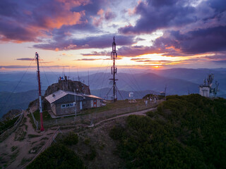 Wall Mural - weather station and sunset clouds. Ceahlau Toaca, Romania