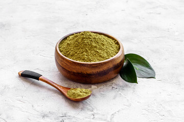 Matcha tea powder with green leaf. Asian beverage concept