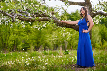 Sticker - Young woman in apple orchard