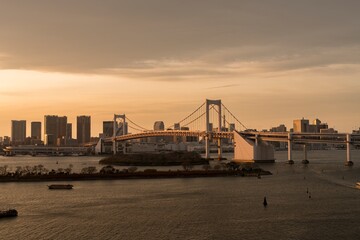 Wall Mural - The Rainbow Bridge neighborhood in Tokyo Japan at Sunset