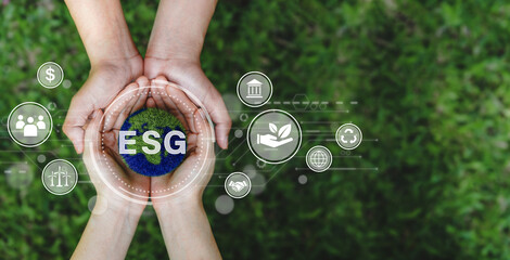 ESG icon concept and earth in the hand for environmental, social, and governance in sustainable corporation development and ethical business on a green background whith Copy space.