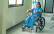 © supAVADEE BUTRADEE - Elderly Asian woman handicapped, sitting in a wheelchair in a hospital