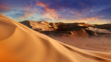 Panorama Of Sand Dunes Sahara Desert At Sunset. Endless Dunes Of Yellow Sand. Desert Landscape Waves Sand Nature