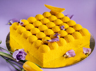 Sticker - yellow mousse cake on purple background