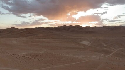 Canvas Print - Colorful desert sunset with mountains and clouds near Trona, California