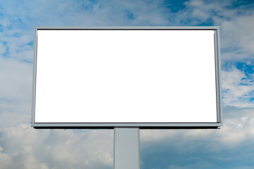 Wall Mural - front view: blank white billboard or large display against blue sky with white clouds - mock up. whi