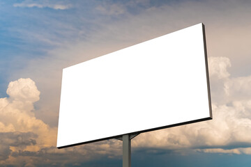 Wall Mural - mock up - blank white billboard against warm sunset sky with clouds. consumerism, white screen, temp