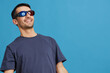 © SHOTPRIME STUDIO - handsome man Cheerful man in cinema glasses in a t-shirt cropped view