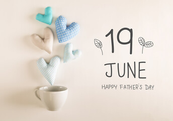 Wall Mural - Father's Day message with blue heart cushions coming out of a coffee cup