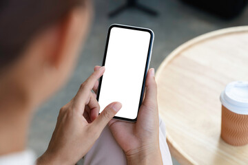 Aufkleber - close-up a woman holding and touch smartphone blank screen