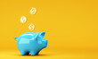 Blue piggy bank with falling dollar coins on bright background