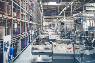 Interior of an industrial workshop or shop inside for the production of automotive wiring.