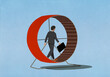 © fStop - Businessman with briefcase walking in hamster wheel
