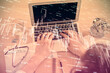 © peshkova - Double exposure of man's hands typing over laptop keyboard and forex chart hologram drawing. Top view. Financial markets concept.