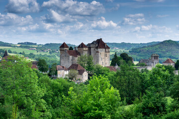 Wall Mural - the picturesque Plas Chateau in the historic Frenmch village of Curemonte in the Dordogne Valley