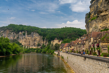 Sticker - view of the historic village of La Roque-Gageac with the Dordogne River and cliffside houses