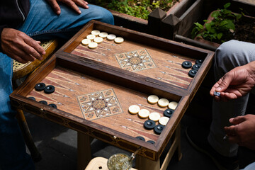 Backgammon, two men playing backgammon