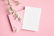 Blank Invitation Card Mockup With Envelope And Flowers