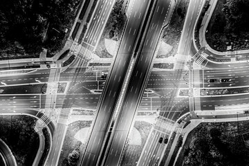 Wall Mural - Aerial view of landscape perfect night road, top view at night traffic long exposure. color tone effect. Black and white