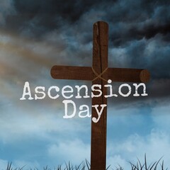 Wall Mural - Ascension day text with wooden cross against dramatic sky, copy space