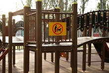 Sign NO DOGS ALLOWED At Children's Playground