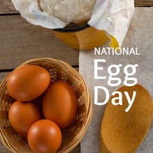 Composite Of National Egg Day Text With Brown Eggs In Basket On Table, Copy Space
