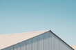 Industrial architecture. Close up of warehouse roof and facade.