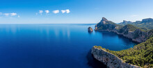 Panoramic View Of Beautiful Mediterranean Seascape. Scenic Rocky Cliffs On Seaside Against Sky. Idyllic Blue Ocean At Island In Summer.