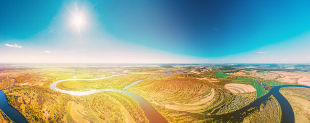 Wall Mural - Panorama Aerial View Green Forest Woods And River Landscape In Sunny Spring Summer Day. Sunshine, Top View Of Nature, Bird's Eye View. Trees Standing In Water During Spring Flood floodwaters. woods in