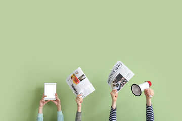 People with newspapers, tablet computer and megaphone on green background