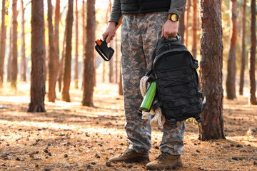 Sticker - Male tourist with survival kit in forest