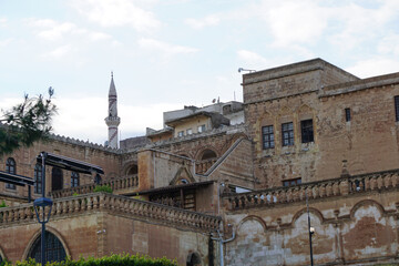 Wall Mural - Artuklu Mardin, Turkey 7 May 2022 Mardin landscape at sunset with minaret of Ulu Cami, also known as Great mosque of Mardin