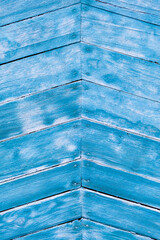 Poster - Wood texture with blue flaked paint. Peeling paint on weathered wood. Old cracked paint pattern on rusty background. Chapped paint on an old wooden surface