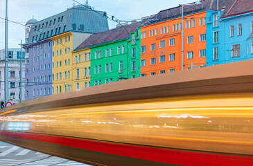 Wall Mural - Tram moving on a street with colorful bulding - Vienna, Austria