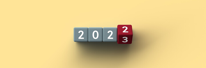 Wall Mural - 3d cubes with the years 2022-2023 on a yellow paper background
