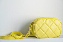 Lime Cross Body Bag. Ladies Bright-colored Handbag On Gray Background. Yellow Bag.