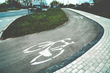 Bend On The Cycle Path With Horizontal Signs