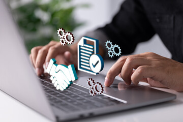 Aufkleber - On a laptop computer, an online agreement contract paper. Concept for an online business arrangement.