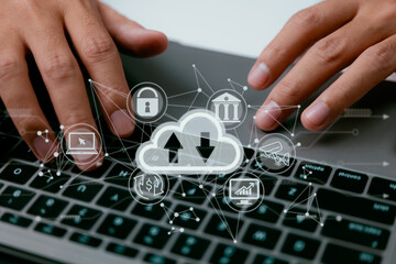 Leinwandbilder - A cloud computing diagram is displayed on a laptop in the hands of a man. Networking and internet service principles for data storage in the cloud.