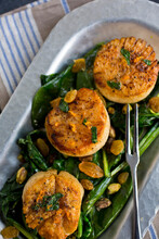 Seared Scallops With Spinach And Golden Raisins